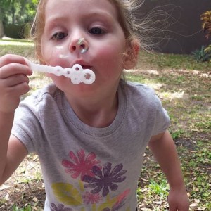 Bailey blowing bubbles!