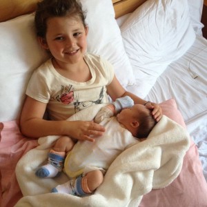 Sophie holding Freddie.